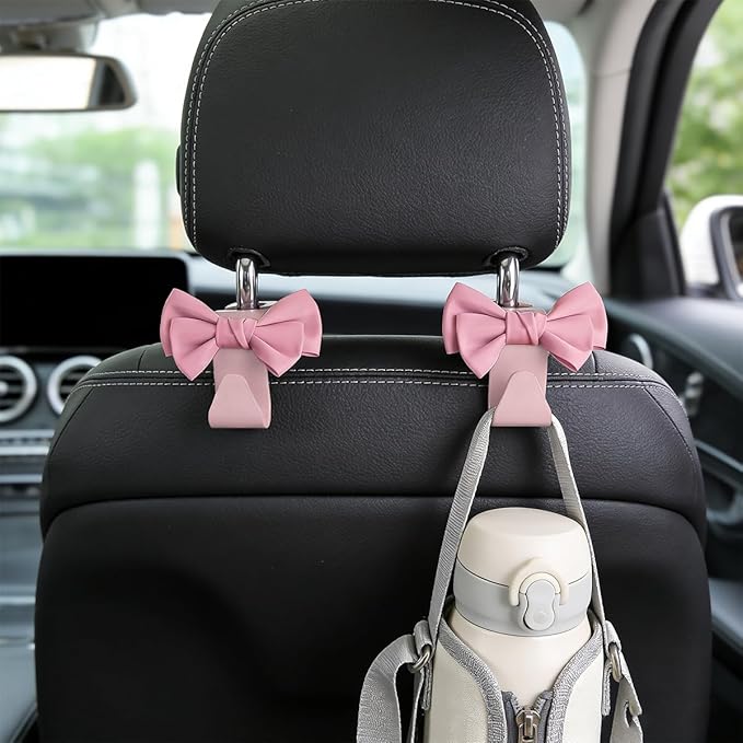 2PCS Cute Bow Car Seat Headrest Hook, Multifunctional Backseat Storage Hanger for Purse Handbag Coat, Automotive Seat Back Bag Holder Organizer, Universal for SUV RV Truck (Pink)